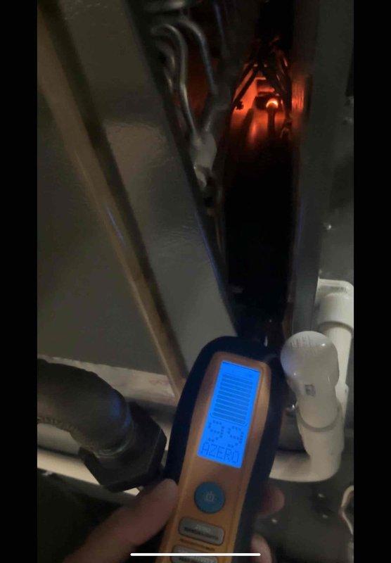 Returned to property for warranty leak search on 2-year-old Daikin system with complete AC failure. Utilized electronic leak detection equipment to inspect refrigerant lines, connections, and indoor air handler components. Performed comprehensive diagnostic testing of the system to identify source of refrigerant loss affecting cooling operation.
