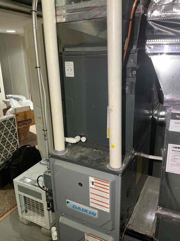 Returned to property for warranty leak search on 2-year-old Daikin system with complete AC failure. Utilized electronic leak detection equipment to inspect refrigerant lines, connections, and indoor air handler components. Performed comprehensive diagnostic testing of the system to identify source of refrigerant loss affecting cooling operation.