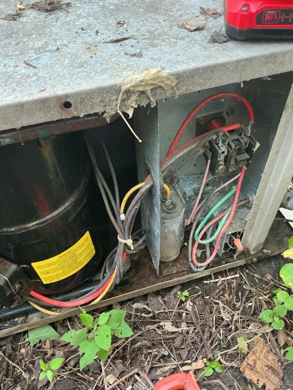 Responded to service call for air conditioning unit that would not shut off and required manual shutdown at furnace switch. Upon inspection of the outdoor condensing unit and electrical disconnect, found aged equipment with corroded wiring connections and deteriorated components. Diagnosed faulty contactor causing unit to run continuously without responding to thermostat signals. Replaced defective contactor, cleaned electrical connections, and verified proper system operation with normal on/off cycling restored.