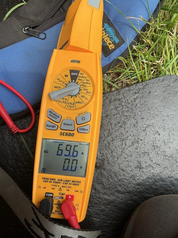 Responded to service call for 2-month-old AC system producing loud clanking noise during startup and shutdown cycles. Performed diagnostic testing on both indoor and outdoor units using clamp meter and multimeter to measure electrical parameters including amperage, voltage, and capacitance readings. Conducted thorough inspection of compressor, condenser fan motor, and electrical components to identify source of abnormal noise in recently installed equipment.