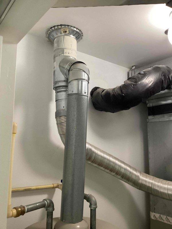 Performed city certification inspection on 10+ year old furnace and air conditioning system located in basement. Conducted comprehensive evaluation of HVAC equipment, including visual inspection of furnace cabinet, ductwork connections, venting system, and electrical components to verify compliance with municipal rental property requirements. Documented equipment condition with photographs showing furnace unit with proper labeling, flexible ductwork installation, and associated mechanical components in satisfactory operating condition for certification purposes.