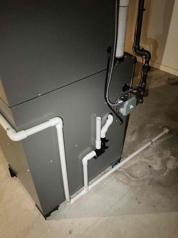 Completed full HVAC system installation including 110,000 BTU furnace and 3.5-ton air conditioning unit in basement mechanical room. Installed new thermostat, humidifier, and configured all ductwork connections with proper supply and return air pathways. Established PVC condensate drainage system, reconnected electrical service, and completed all mechanical and electrical permit requirements per specifications.