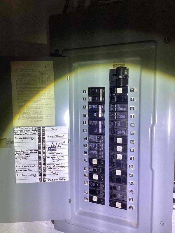 Completed comprehensive Gold AC inspection on two HVAC systems serving residential property, including a 7-year-old unit and a 1-year-old unit with equipment located in attic and basement areas. Performed thorough evaluation of basement-mounted air handler system, inspecting stacked components, control panels, ductwork connections, refrigerant lines, and electrical connections at breaker panel. Documented current condition of both systems including filter assemblies, Energy Star rated components, flexible duct routing, and copper line sets with proper insulation. Provided detailed replacement estimate for aging 7-year-old system based on inspection findings and equipment performance assessment.