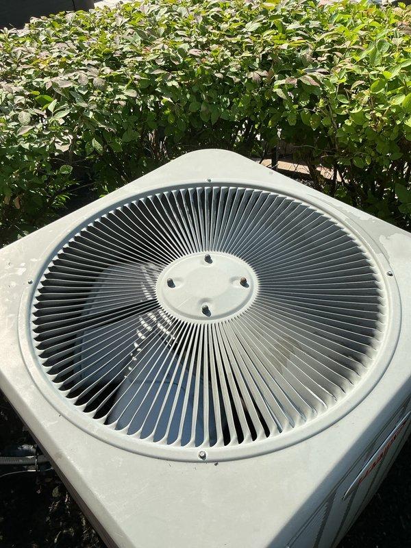 Completed comprehensive tune-up and inspection on 2013 outdoor air conditioning condenser unit. Performed multi-point system evaluation including electrical disconnect box inspection, condenser coil assessment, fan motor operation check, and refrigerant system analysis. Additionally inspected and evaluated humidifier, thermostat functionality, and hot water tank as part of complete HVAC system assessment. Unit found in good operating condition with all components functioning properly and no immediate service needs identified.