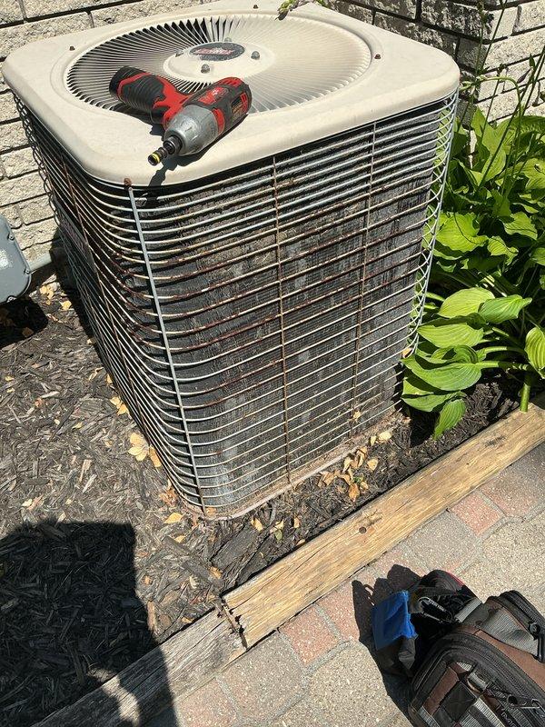 Completed annual cooling maintenance and tune-up on a 27-year-old Lennox outdoor condenser unit. Performed comprehensive system inspection, verified proper operation of all components, and confirmed unit is functioning correctly. Condenser showed normal wear for age with some debris accumulation in fins and surrounding landscape area, system operating within normal parameters at time of service.