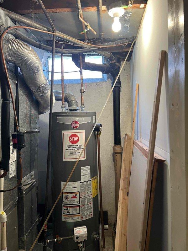 Completed comprehensive Gold Plan air conditioning maintenance on a 10-year-old basement-located AC unit. Performed full system inspection including refrigerant level check, electrical component testing, condenser and evaporator coil cleaning, air filter replacement, thermostat calibration, and condensate drain line clearing. All system components found operating within manufacturer specifications with no immediate repairs required; unit is in good working condition for the cooling season.