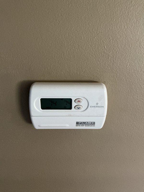 Completed HVAC system evaluation for replacement estimate on residential property with 30+ year old equipment utilizing R22 refrigerant. Inspected basement-located air handler unit, existing ductwork configuration, and current thermostat controls to assess system condition and provide comprehensive replacement options for aging cooling system.