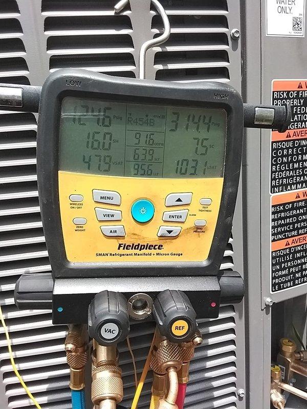 Completed installation of 2.5-ton Lennox air conditioning system with matching evaporator coil at residential property. Unit was positioned on pad at rear of building with proper electrical disconnect and reconnection to existing service panel. System was charged with refrigerant, pressures and temperatures verified within manufacturer specifications using digital manifold gauges, and unit tested for proper operation. Mechanical, electrical, and air conditioning permits requested for compliance.
