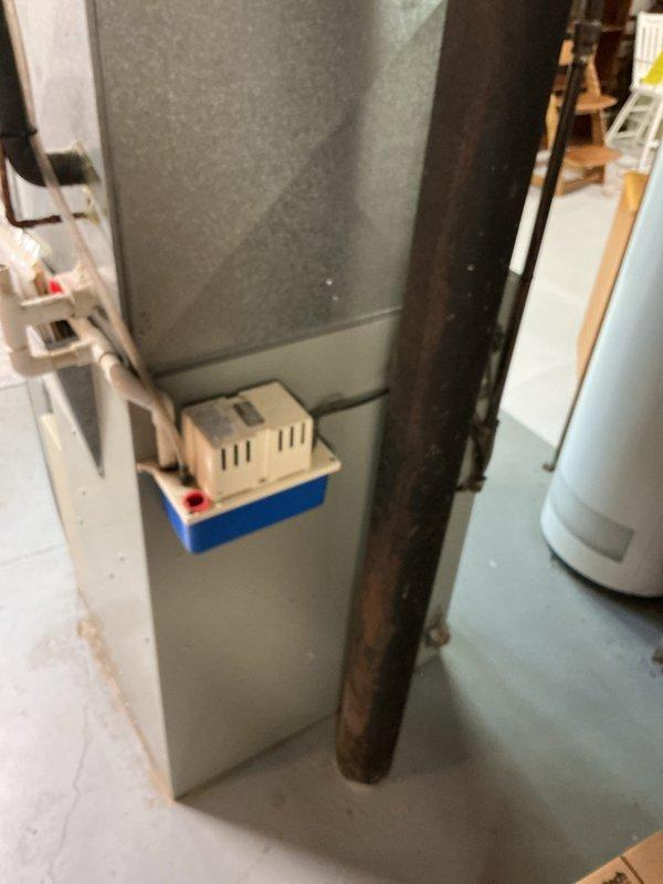Responded to service call for 26-year-old air conditioning system with loud condenser fan noise in basement installation. Upon arrival, confirmed system had been shut down by occupant but was providing adequate cooling prior to shutdown. Conducted comprehensive system evaluation and documented existing equipment configuration including air handler, thermostat, and associated components. Based on age of equipment and presenting symptoms, provided estimate for complete HVAC system replacement as most cost-effective long-term solution given the advanced age of the unit and potential for additional component failures.