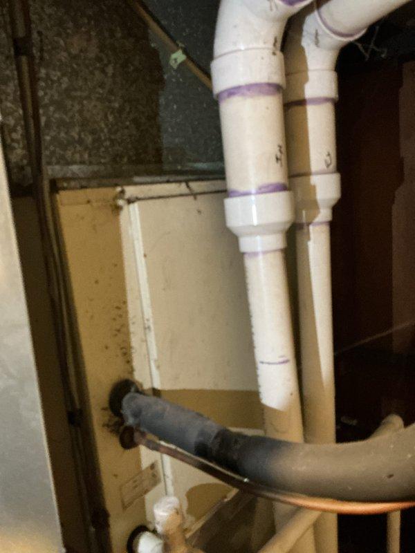 Responded to service call for air conditioning unit tripping breaker when activated, affecting 10+ year old cooling system located in basement. Conducted comprehensive assessment of electrical components, compressor operation, and overall system functionality. Provided detailed estimate for complete HVAC system replacement, documenting existing plumbing infrastructure and drainage configuration associated with current equipment installation.