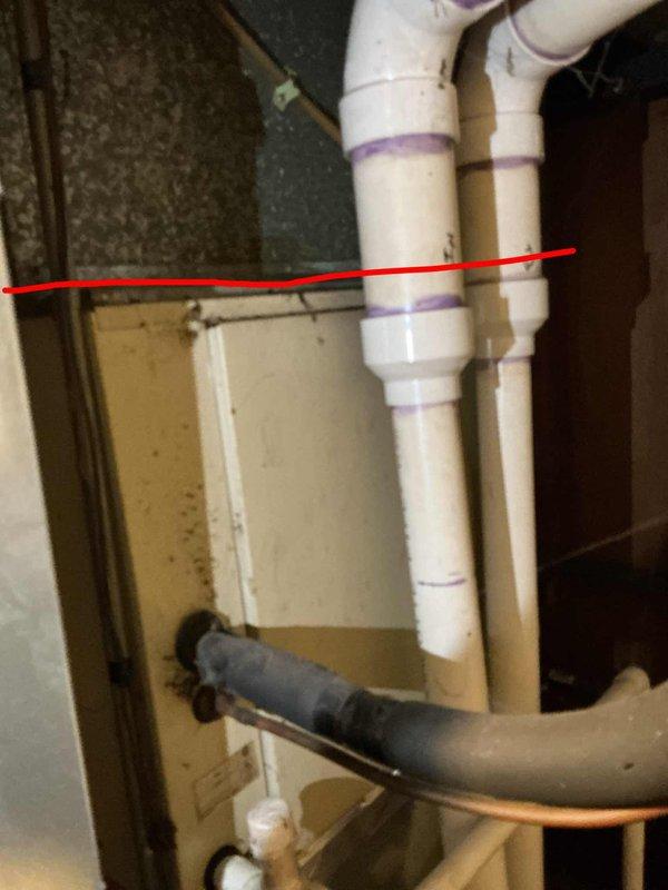 Responded to service call for air conditioning unit tripping breaker when activated, affecting 10+ year old cooling system located in basement. Conducted comprehensive assessment of electrical components, compressor operation, and overall system functionality. Provided detailed estimate for complete HVAC system replacement, documenting existing plumbing infrastructure and drainage configuration associated with current equipment installation.