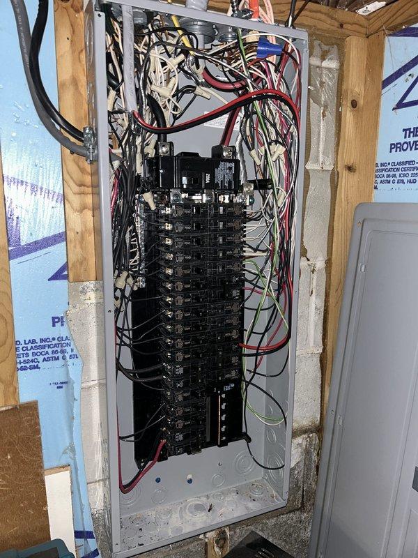 Completed full HVAC system installation including a 90,000 BTU furnace and 3-ton air conditioning unit in rear yard location. Installed Ecobee 3 Lite smart thermostat with calibration and mobile app connectivity, added humidifier, and reconnected existing electrical service. Coordinated electrical panel work with licensed electrician to ensure proper circuit breaker installation and load distribution for new equipment, obtained mechanical and electrical permits, and submitted documentation for utility rebate program with AHRI certification number on file.