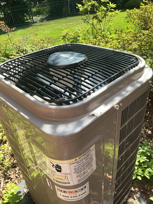 Completed routine annual cooling maintenance on two residential air conditioning units. Both systems were operational upon arrival and confirmed working properly throughout inspection. Performed comprehensive AC tune-up including visual inspection of outdoor condensing units, checked refrigerant levels, inspected electrical connections, verified proper airflow through coils, and cleaned debris from exterior surfaces. Both units showed normal weathering consistent with age and outdoor exposure, with minor accumulation of leaves and dirt around bases. Heat exchanger coils, protective grilles, and manufacturer labels intact on both systems. All components functioning within normal parameters with no immediate repairs required.