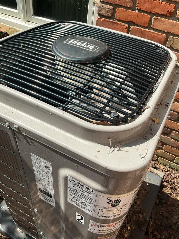 Completed routine annual cooling maintenance on two residential air conditioning units. Both systems were operational upon arrival and confirmed working properly throughout inspection. Performed comprehensive AC tune-up including visual inspection of outdoor condensing units, checked refrigerant levels, inspected electrical connections, verified proper airflow through coils, and cleaned debris from exterior surfaces. Both units showed normal weathering consistent with age and outdoor exposure, with minor accumulation of leaves and dirt around bases. Heat exchanger coils, protective grilles, and manufacturer labels intact on both systems. All components functioning within normal parameters with no immediate repairs required.