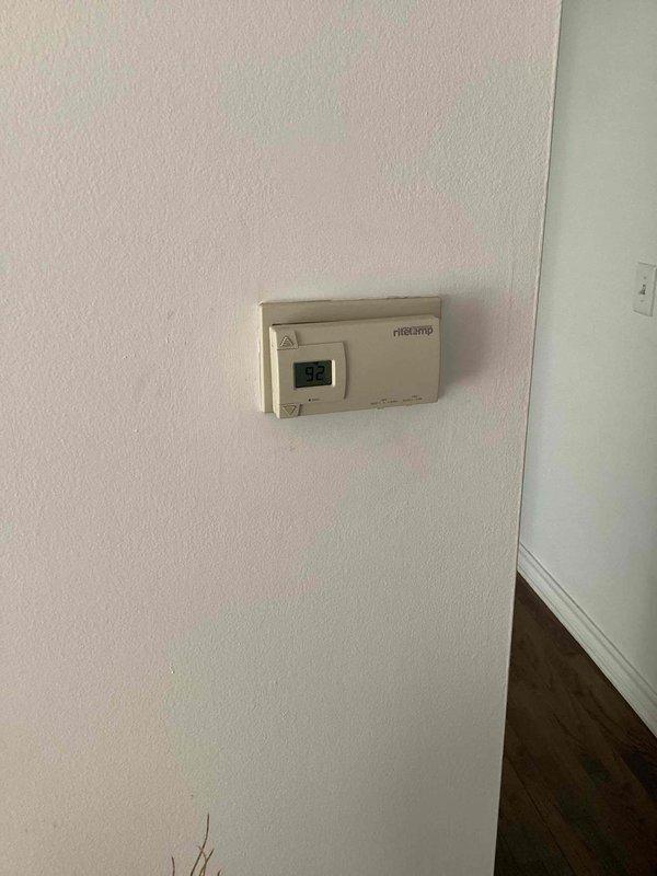 Provided equipment replacement estimate for 15-year-old R22 system currently low on refrigerant and located in bedroom closet. Assessed existing natural gas furnace and air conditioning unit configuration, documented current thermostat setup and equipment access points. Coordinated estimate details with both tenant and property owner for comprehensive replacement options.