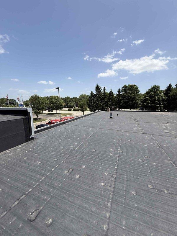 Responded to no cooling complaint for office area rooftop unit at commercial facility. Accessed RTU via ladder to diagnose air conditioning system not providing adequate cooling. Upon inspection, identified and resolved cooling deficiency, restoring proper airflow and temperature control to the office space.