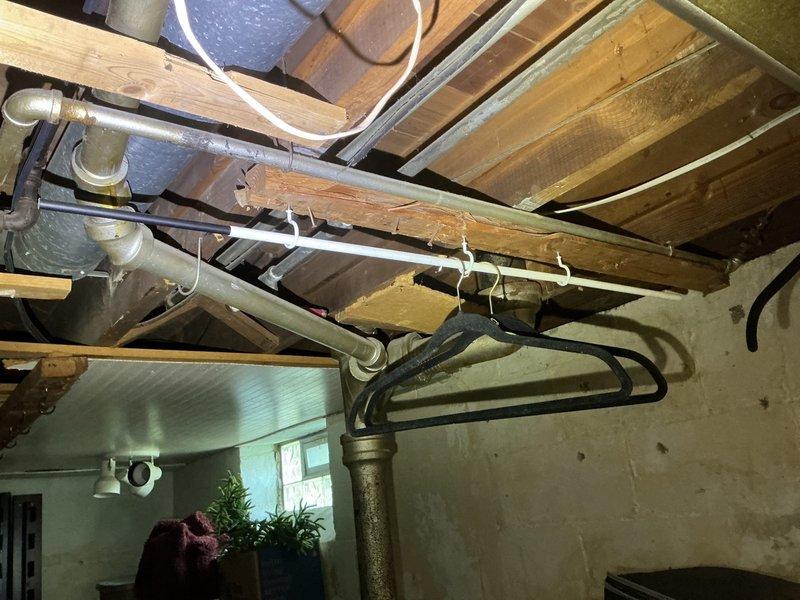 Inspected gas line connection to dryer in basement area to verify proper installation, secure fittings, and absence of leaks. Replaced damaged dryer vent that had split in half with new venting system, ensuring proper routing through crawl space and secure connections to prevent lint buildup and maintain safe exhaust flow. All gas connections tested and confirmed operational with no leaks detected.