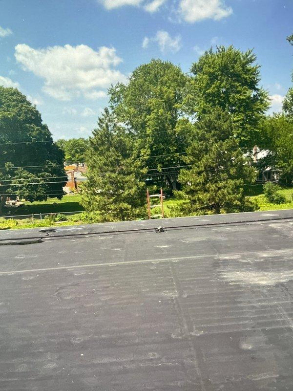 Performed scheduled filter maintenance on two rooftop units at commercial facility. Accessed roof-mounted RTUs and replaced existing air filters with Koch brand filters that were available on-site. All units returned to normal operation with improved airflow following filter replacement.