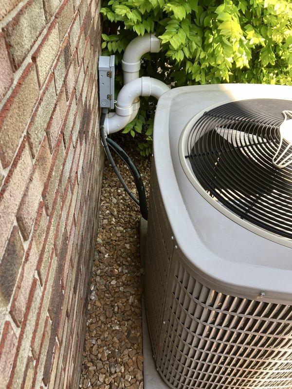 Responded to service call for complete system failure affecting both heating and cooling control. Basement furnace (approximately 3 years old) and smart thermostat were non-operational, leaving entire residence without HVAC control. Performed diagnostic assessment and documented existing outdoor condensing unit and electrical metering configuration. Provided comprehensive replacement estimate for failed equipment to restore full system functionality.
