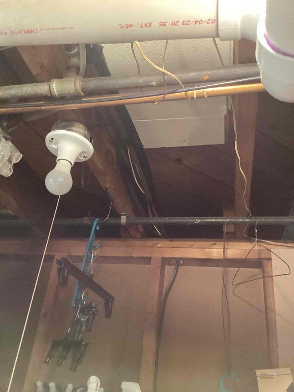 Completed comprehensive HVAC system evaluation for 26-year-old R22 heating and cooling system located in basement. Identified low refrigerant charge in air conditioning unit and assessed overall condition of aging Lennox furnace with AprilAire humidifier component. Provided replacement estimate for complete system upgrade due to obsolete R22 refrigerant and equipment age exceeding typical service life.