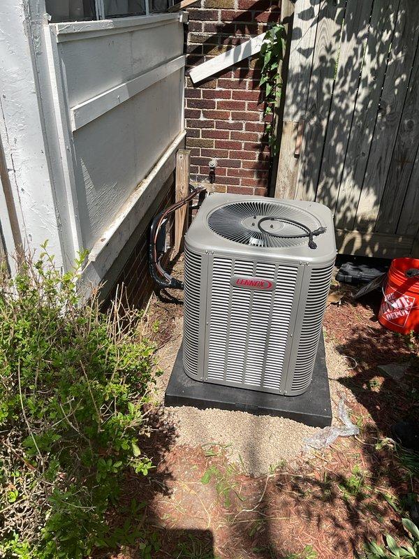 Completed installation of a new 2-ton air conditioning system including outdoor condensing unit and indoor evaporator coil. Installed Bryant condenser on concrete pad in side yard with properly insulated refrigerant lines routed to interior air handler, secured new electrical circuit as required, and obtained mechanical and electrical permits. System tested and operational upon completion.