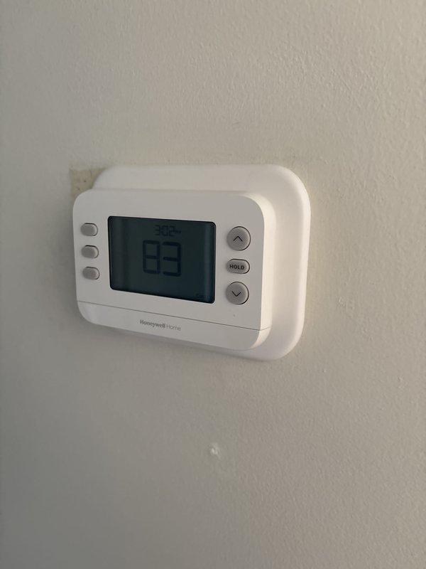 Completed full HVAC system installation including a 70,000 BTU furnace, 2-ton air conditioning unit positioned in left side yard, 40-gallon hot water tank, and condensate pump. Installed new Honeywell Home thermostat with programmable controls and integrated humidifier system for improved indoor air quality. Coordinated electrical work for new dedicated circuit installation to meet code requirements, obtained mechanical and electrical permits, and documented DTE energy efficiency rebate eligibility for qualifying equipment.