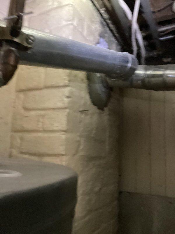 Responded to service call for central air conditioning system evaluation. Upon arrival, conducted comprehensive equipment assessment in basement utility area where HVAC system is located. Documented existing conditions including ceiling damage in mechanical space and current installation configuration of ductwork and equipment components. System confirmed operational for both heating and cooling functions at time of inspection. Provided estimate recommendations for equipment replacement options based on assessment findings.