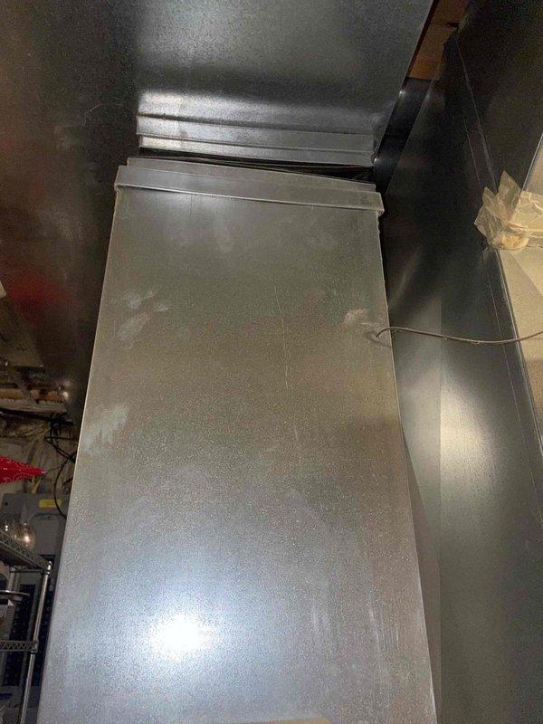 Completed comprehensive HVAC system replacement estimate for 25-year-old equipment consisting of furnace located in basement and air conditioning unit positioned outside. Assessed existing Carrier furnace installation, ductwork configuration including sheet metal plenums and flexible ducting, and outdoor condensing unit to provide replacement recommendations for complete heating and cooling system upgrade.