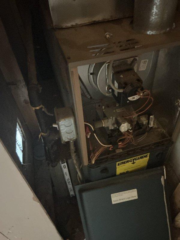 Responded to reports of a possible gas leak in the kitchen area of a 111-year-old residential property. Conducted comprehensive pressure testing on the kitchen gas line to identify the source of the suspected leak that had been ongoing for approximately one month. Testing required accessing gas supply lines behind wall surfaces, necessitating removal of drywall sections to expose piping for thorough inspection. Performed systematic pressure test protocol on all accessible gas line segments serving the upstairs kitchen area. Inspected gas furnace connections and related gas distribution lines in the basement utility area to rule out any secondary leak points in the system. All testing procedures followed current safety standards and code requirements for gas line integrity verification. Documented findings with photographic evidence of accessed areas and testing points for service records.
