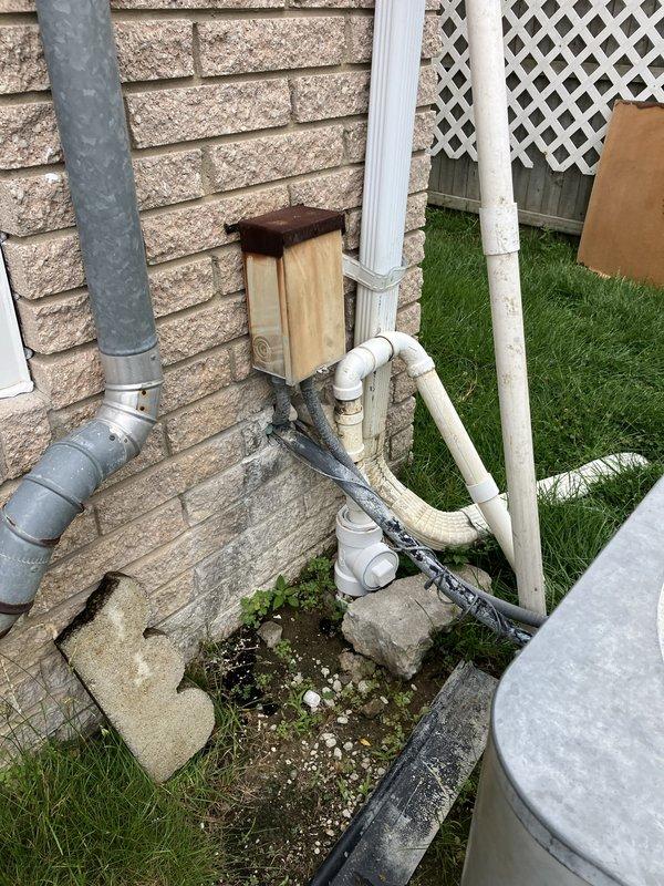 Conducted comprehensive assessment of 40-year-old residential air conditioning system for replacement estimate. Evaluated existing outdoor condensing unit showing significant age-related wear and deterioration, along with associated refrigerant lines and electrical connections. Documented current equipment configuration, including exterior wall-mounted components and basement furnace setup, and provided detailed replacement recommendations for new Lennox comfort system to improve efficiency and reliability.