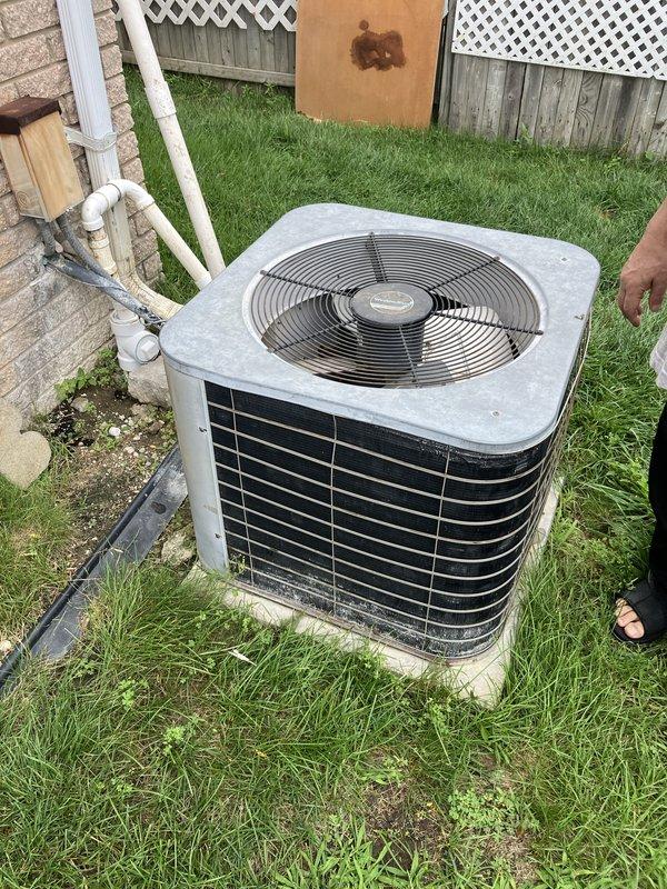 Conducted comprehensive assessment of 40-year-old residential air conditioning system for replacement estimate. Evaluated existing outdoor condensing unit showing significant age-related wear and deterioration, along with associated refrigerant lines and electrical connections. Documented current equipment configuration, including exterior wall-mounted components and basement furnace setup, and provided detailed replacement recommendations for new Lennox comfort system to improve efficiency and reliability.