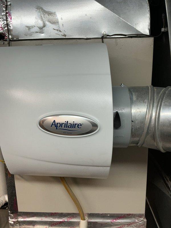 Completed comprehensive Gold AC Inspection on two exterior air conditioning units as part of routine preventive maintenance program. Performed multi-point inspection including refrigerant level verification, electrical connection testing, condenser coil cleaning, air filter evaluation, thermostat calibration, and operational performance assessment on both systems. Inspected indoor HVAC components including Bryant furnace, Aprilaire whole-home humidification system, and associated ductwork to ensure proper integration and airflow throughout the system. All equipment found operating within manufacturer specifications with no deficiencies noted; both AC units cycling properly with adequate cooling capacity and no refrigerant leaks detected.