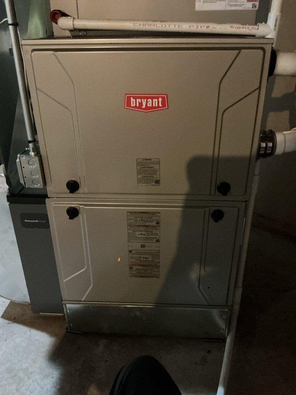 Responded to no cooling call on 4-year-old Bryant system affecting entire home. Upon inspection, discovered failed control board in furnace unit with multiple damaged components including burned resistors and compromised relay terminals. Replaced defective integrated circuit board, verified proper voltage to outdoor condensing unit, tested all safety controls and limit switches, and confirmed system operation with normal temperature differential across evaporator coil. System restored to full cooling capacity with all functions operating within manufacturer specifications.