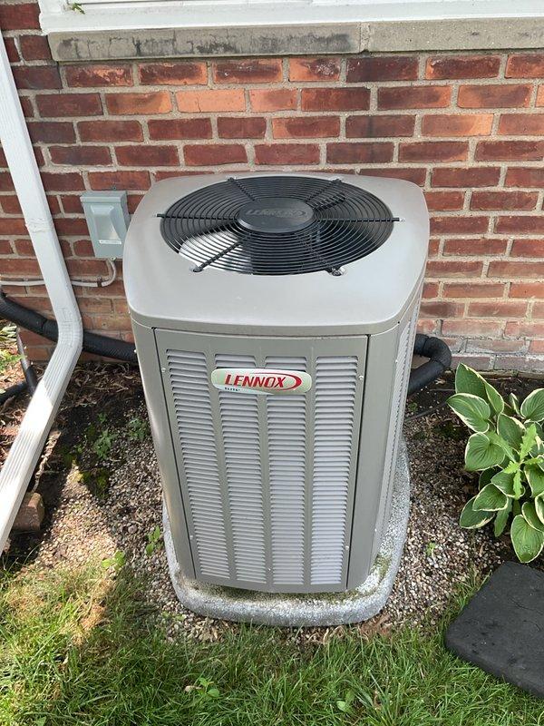 Completed comprehensive Gold AC inspection on 2-year-old Lennox air conditioning system with air handler located in basement. Performed full system evaluation including visual inspection of outdoor condensing unit, verified proper operation of all components, checked refrigerant levels and electrical connections, inspected condensate drainage, and assessed overall system performance. Unit found to be operating within normal parameters with no immediate service needs identified at time of inspection.