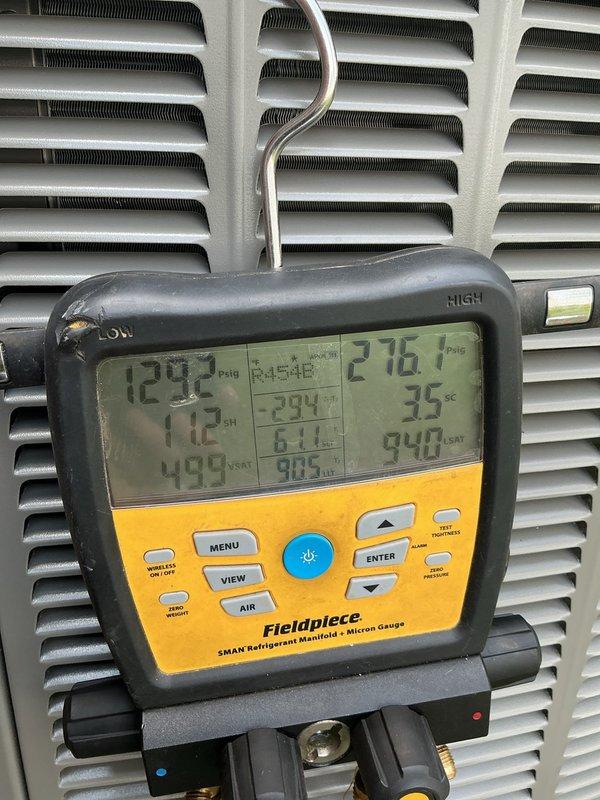 Completed full HVAC system installation including a 45,000 BTU furnace with humidifier and 2-ton rear-discharge air conditioning unit. Installed new thermostat, reconnected electrical service, and performed system startup with refrigerant charge verification using digital manifold gauges, confirming proper pressures and temperatures. All mechanical, electrical, and HVAC permits secured, and system qualified for utility rebate program.