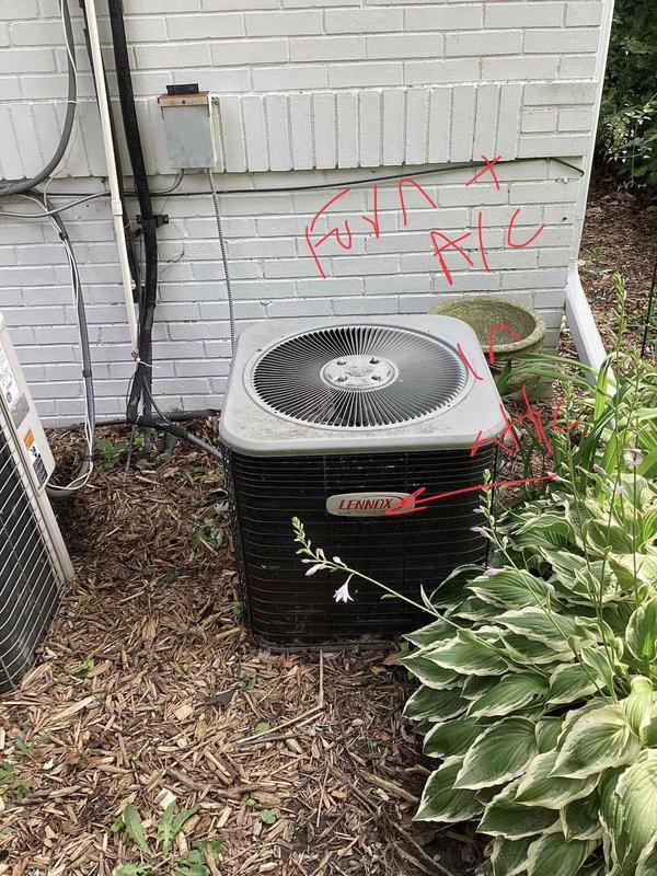 Responded to no cooling complaint on residential air conditioning system. Evaluated 10+ year old Lennox condenser unit located at exterior of property and assessed attic-mounted air handler accessible through bedroom door. Inspected electrical service panel and outdoor condensing unit to determine system condition and operational status. Documented equipment configuration and current state of HVAC components. Provided comprehensive full system replacement estimate for two complete HVAC systems due to age and condition of existing equipment.