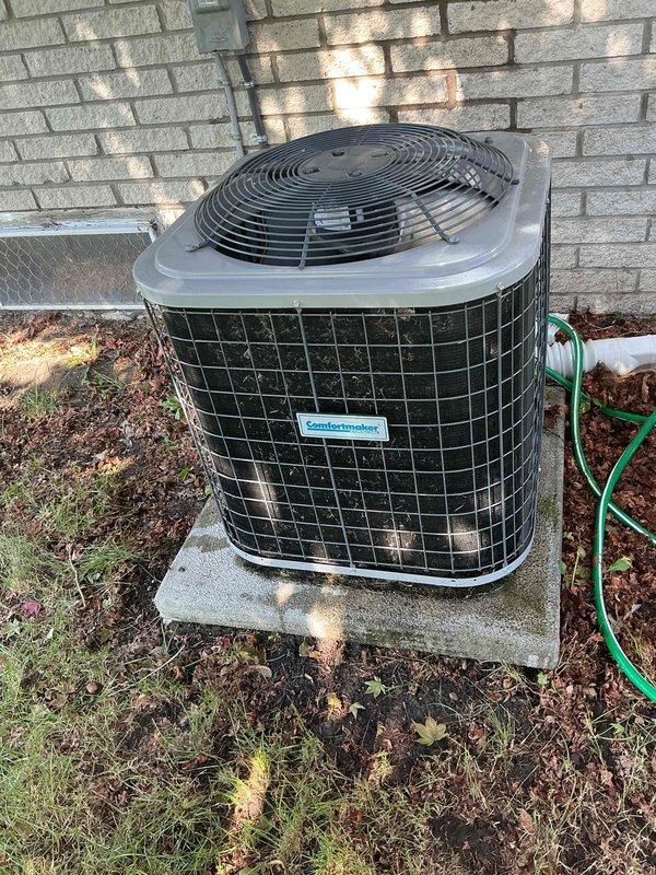 Completed comprehensive tune-up and inspection on 5-year-old Goodman N4A330AKG101 air conditioning system located in basement, including thorough examination of condenser unit, humidifier, and thermostat functionality. Performed water heater flush service on 6-year-old tanked unit as requested. All systems inspected, cleaned, and verified to be operating within manufacturer specifications with photographic documentation of equipment condition and nameplate data.