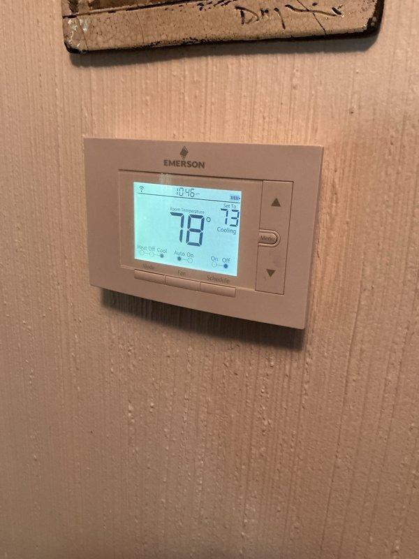 Completed annual tune-up on two five-year-old air conditioning systems. Performed comprehensive inspection of outdoor unit (model CNPVP4821ALAAAAA, manufactured February 2020) and basement unit, including refrigerant level verification, electrical component testing, condenser coil cleaning, and airflow assessment. Verified thermostat operation showing proper cooling mode function at 78°F setpoint, checked filter condition, and confirmed both systems operating within manufacturer specifications with no issues identified.