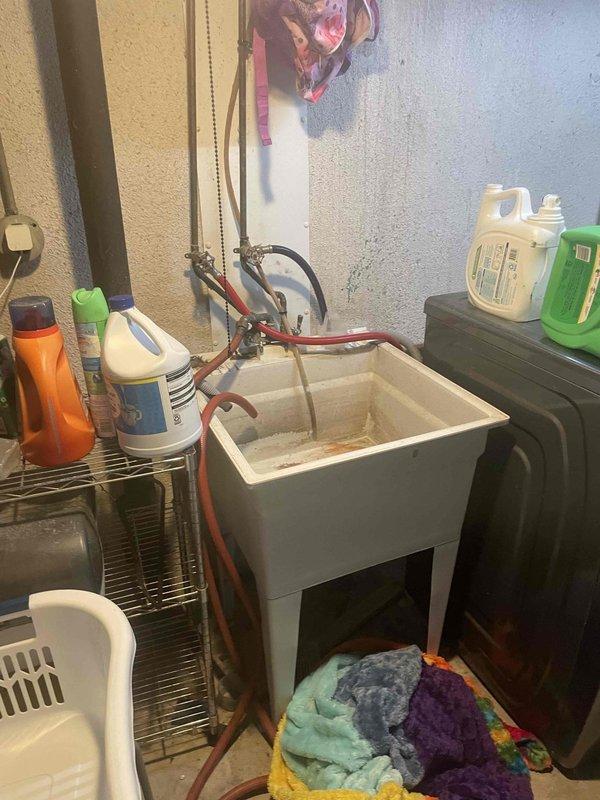 Conducted comprehensive assessment of 22-year-old residential air conditioning system that has failed to adequately cool the home for multiple years. Evaluated outdoor condenser unit located at rear of property and determined unit operates on obsolete R-22 refrigerant, which is no longer manufactured and increasingly cost-prohibitive to service. Due to advanced age of equipment and incompatibility with modern refrigerant standards, provided detailed replacement estimate and discussed available financing options to facilitate system upgrade.
