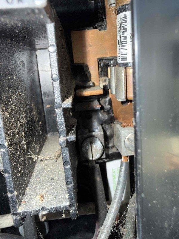 Responded to service call for AC unit running at furnace but not cooling home. Upon inspection, found outdoor condenser unit with heavily soiled coil fins restricting airflow, with accumulated dirt, debris, and organic matter lodged between fins. Cleaned condenser coils to restore proper heat exchange and airflow. Unit tested and confirmed operational with adequate cooling restored to residence.