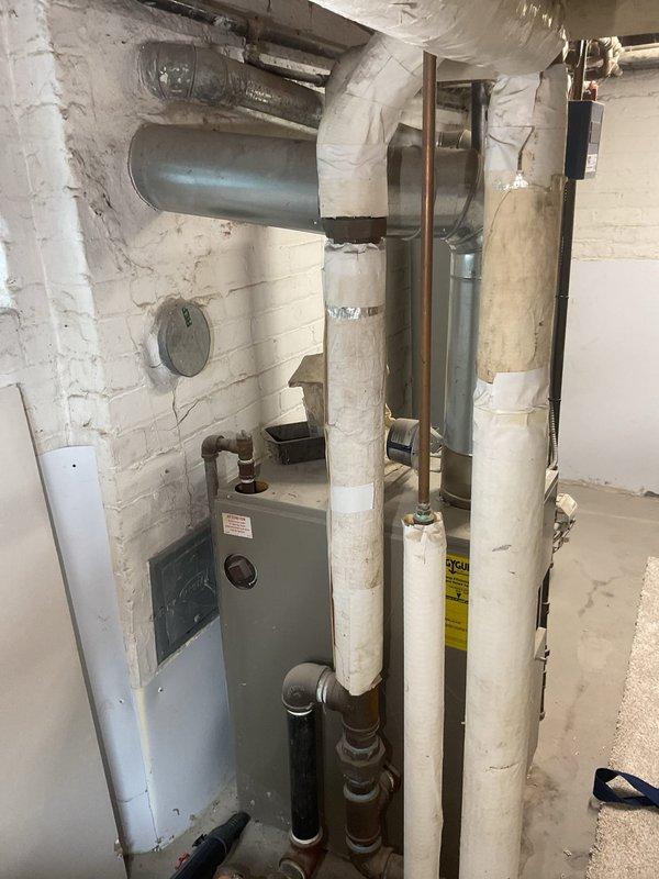 Completed site assessment for radiator relocation from kitchen to dining room. Disconnected 10+ year old six-column radiator from existing supply and return lines, capped connections at original location in kitchen. Evaluated basement mechanical room and existing piping infrastructure to determine routing requirements for new installation location in dining room.