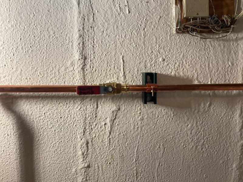 Installed battery backup system for existing sump pump to provide emergency operation during power outages. Performed backflow prevention device testing on copper piping system with test cocks to ensure proper operation and compliance with local plumbing codes. Completed all work in accordance with permit requirements, verifying proper installation of backflow preventer assembly with isolation valves and test ports. System tested and confirmed operational.