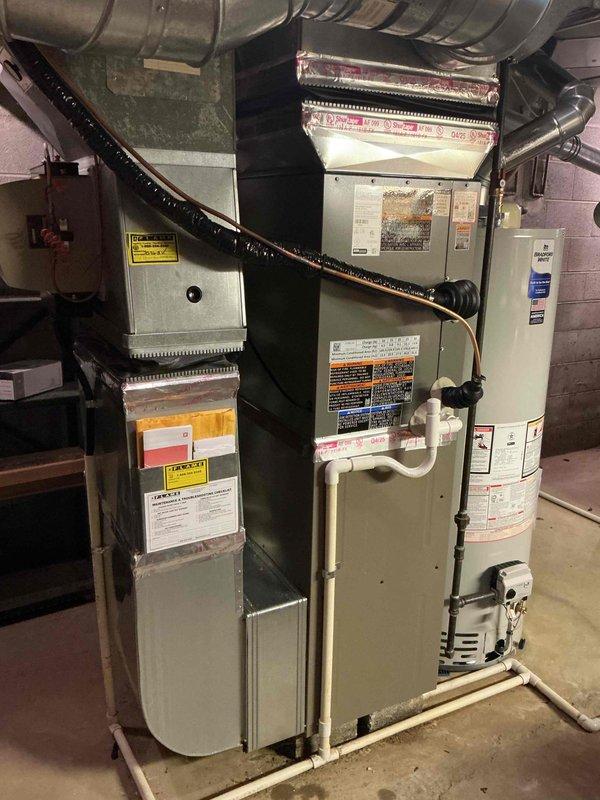 Completed installation of 3-ton air conditioning system with matching evaporator coil in left side yard location. Connected new outdoor condensing unit and indoor coil to existing furnace system, performed all mechanical and electrical connections per manufacturer specifications, and reconnected ductwork. Verified proper refrigerant charge, tested system operation, and confirmed all components functioning correctly with permits requested for final inspection.