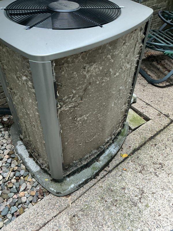 # HVAC Maintenance - Gold AC Inspection

Performed comprehensive annual maintenance on a 3-year-old residential air conditioning system located in the backyard. Conducted complete system inspection including electrical connections, refrigerant levels, and component operation verification. Noted significant exterior dirt and grime accumulation on condenser unit panels requiring attention during service.

Inspected condenser unit thoroughly, checking fan motor operation, blade assembly integrity, and protective grille condition. Verified proper airflow through condenser coils despite visible dust and debris buildup on exterior metal fins. Tested capacitor performance and measured voltage and amperage readings to ensure system operating within manufacturer specifications.

Examined condensate drain pan and base mounting for proper positioning and drainage. Confirmed unit secured on concrete pad with appropriate vibration dampening. Checked refrigerant pressures on both high and low sides,