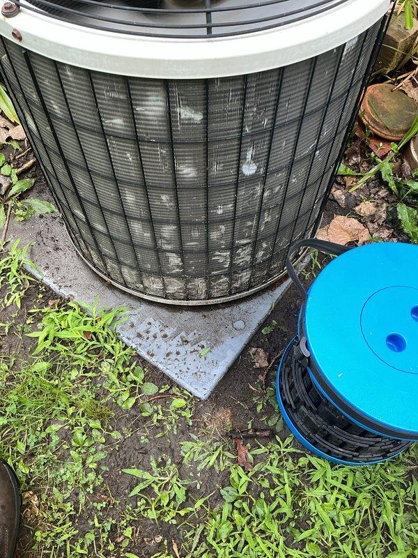 Completed comprehensive air conditioning tune-up and inspection on 17-year-old cooling system with outdoor condenser unit located on concrete pad. Performed standard maintenance protocol including visual inspection of condenser cabinet, fan assembly, and exterior coil fins, verified unit operational status, and assessed overall system condition. Equipment found to be functioning with normal wear consistent with age, and homeowner advised of system status upon completion.