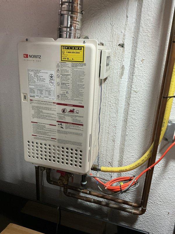 Completed comprehensive Gold AC inspection on 2025 Lennox outdoor condensing unit and basement-located air handler system. Performed visual inspection of condenser cabinet, fan assembly, and refrigerant line connections, confirming unit operational status and proper mounting. Documented equipment condition with photos showing well-maintained condenser on concrete pad with intact cabinet finish and clean fan grille, plus basement mechanical room housing Noritz tankless water heater and associated HVAC components. All systems confirmed operational by homeowner prior to inspection, with single-zone configuration verified and equipment showing no visible signs of wear or damage.