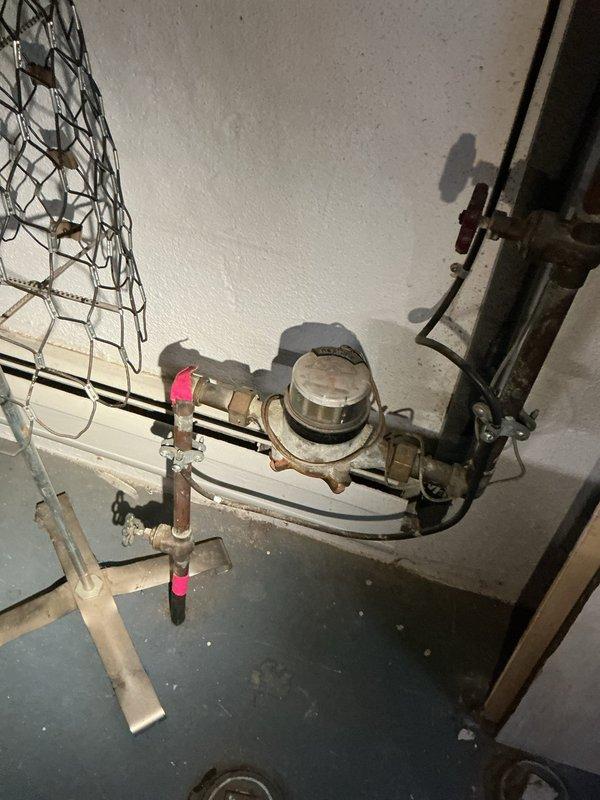 Responded to service call for tanked water heater that had previously gone out and was relit by homeowner. Performed comprehensive system inspection to verify safe and proper operation. Examined water heater unit, checking pilot light assembly, thermocouple, gas valve operation, and burner performance. Inspected all plumbing connections at top of unit, including hot and cold water lines, temperature and pressure relief valve, and shut-off valves for leaks or corrosion. Verified proper venting and flue pipe installation. Tested water meter assembly and main water supply connections for proper flow and pressure. Confirmed all safety labels and warnings were visible and intact. Found system operating within normal parameters with no immediate safety concerns or mechanical deficiencies requiring repair. Unit cycling properly and maintaining temperature setpoint.