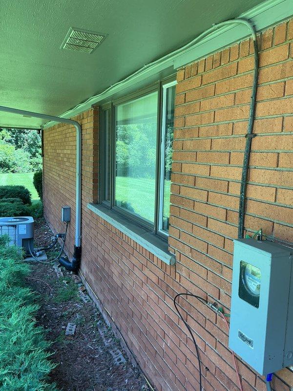 Conducted electrical site assessment for new whole home generator installation at residential property. Evaluated existing electrical panel configuration, circuit capacity, and available breaker positions to determine compatibility and integration requirements for generator system. Documented exterior wall conditions, utility meter location, and optimal positioning for generator unit and associated electrical conduit routing from service panel to proposed generator pad location.