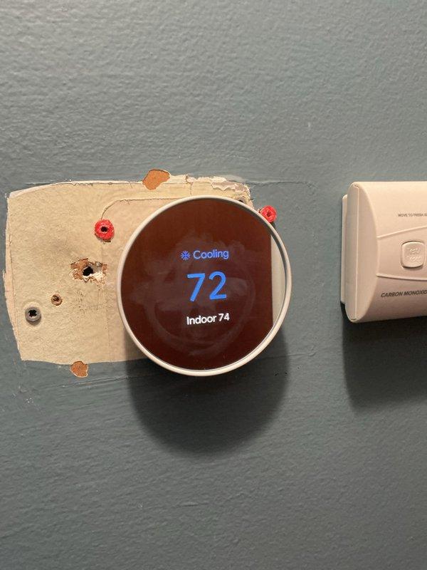 Responded to complaint of air conditioning system running continuously without cycling off. Upon arrival, found 2-month-old AC system with thermostat set to 72°F while indoor temperature reading showed 74°F. Inspected basement-located air handler and associated equipment. Diagnosed thermostat communication issue preventing proper system cycling. Verified proper operation of air handler unit and confirmed all mechanical components functioning within normal parameters. System restored to proper cycling operation with thermostat now accurately controlling temperature setpoints.
