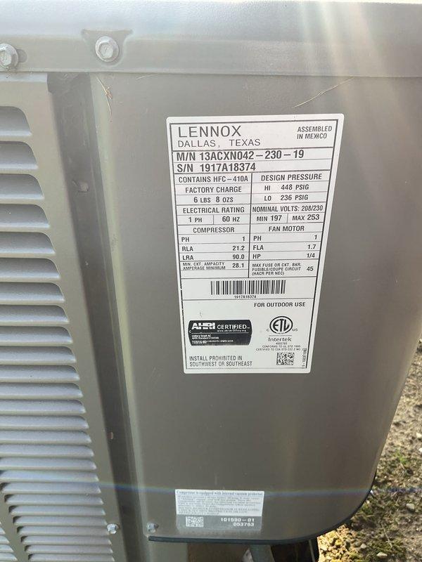 Completed routine maintenance tune-up on a 5-year-old Lennox air conditioning system, model 13ACXN042-230-19, containing R-410A refrigerant. Performed standard inspection procedures, verified electrical specifications and system operation, and documented unit condition with no issues found. System tested and confirmed operating within manufacturer specifications.
